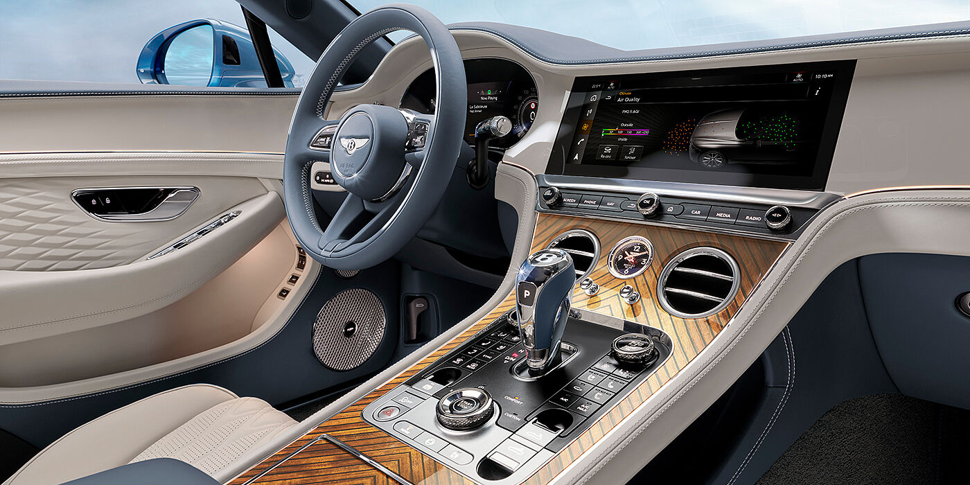 Bentley Belfast New Bentley Continental GTC Azure convertible interior front cabin view with Linen and Brunel hides and Piano Linen by Mulliner veneer featuring centre console and centre MMI screen